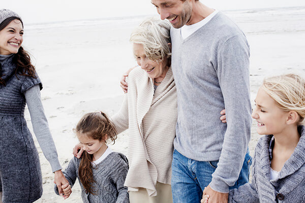 Family walking on beach